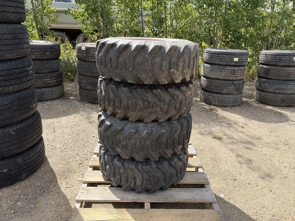 Four Skid Steer Tires & Rims - 10x16.5