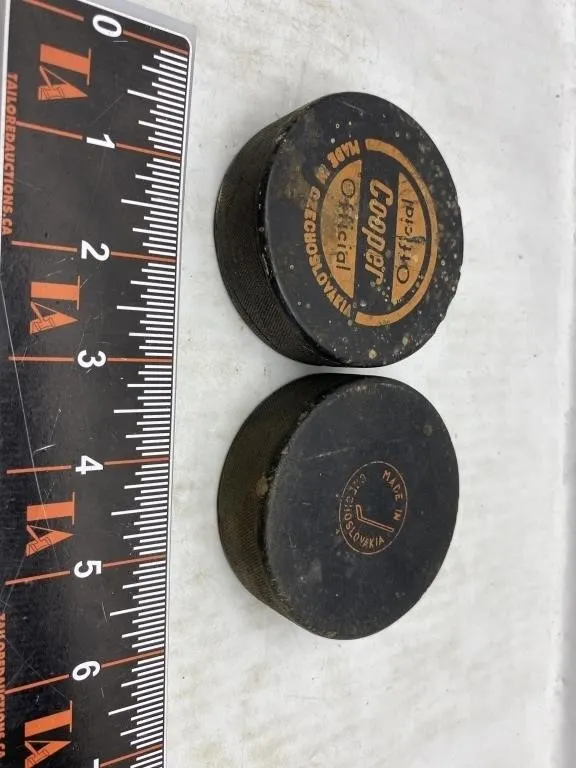 Pair Cooper Official Vintage Hockey Pucks