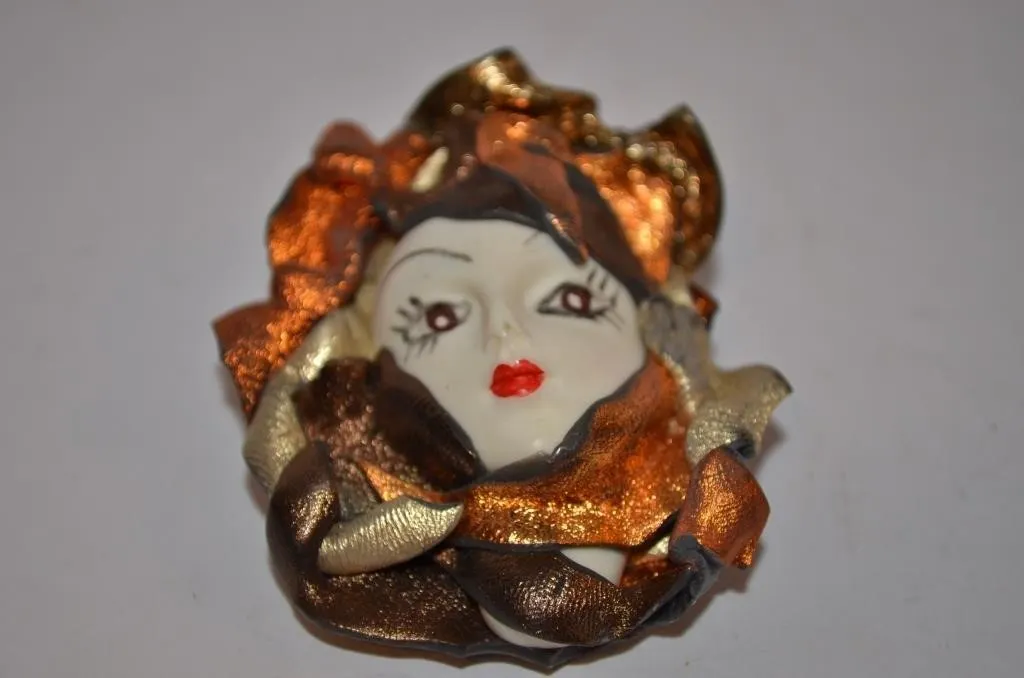 Handcrafted flapper-style lady face brooch
