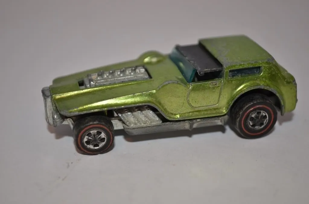 Hot Wheels Redline "The Hood" diecast car in a