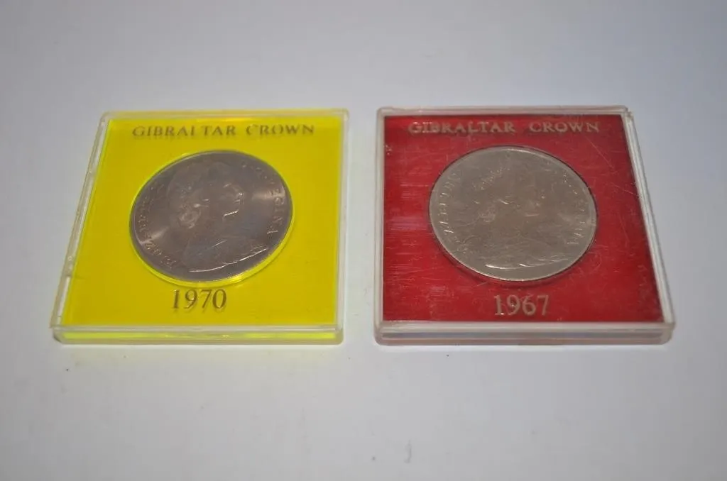 1967 (red case) and 1970 (yellow case) Gibraltar