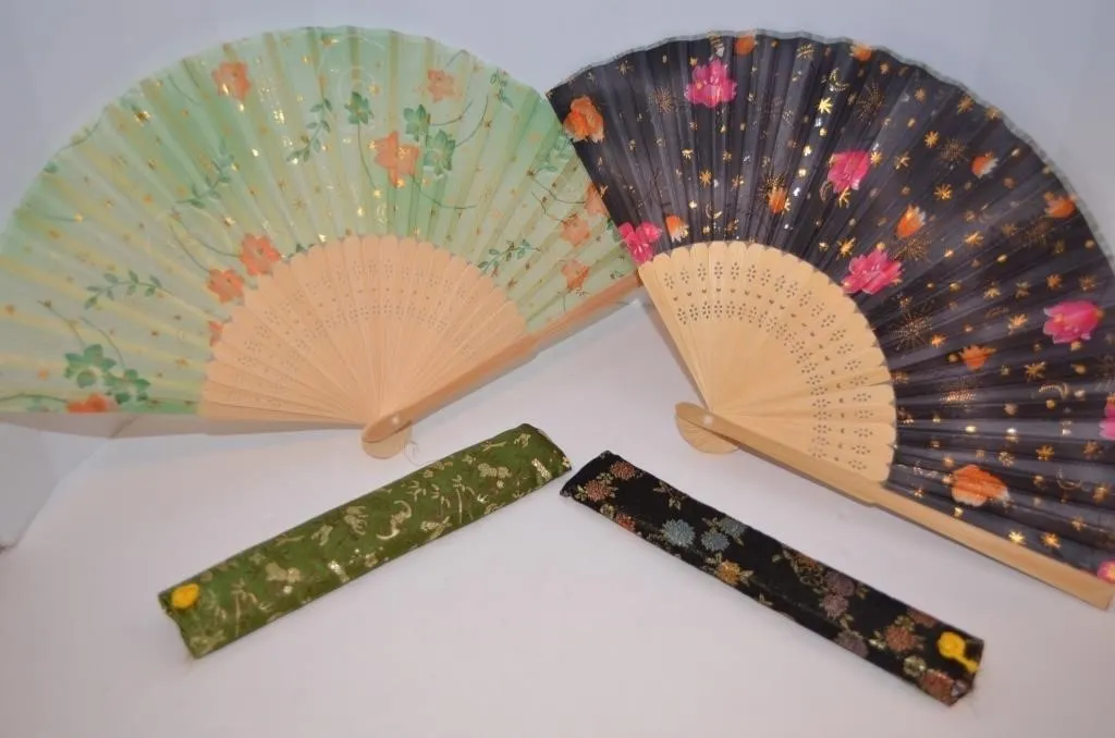 Set of vintage fabric and bamboo hand-held folding