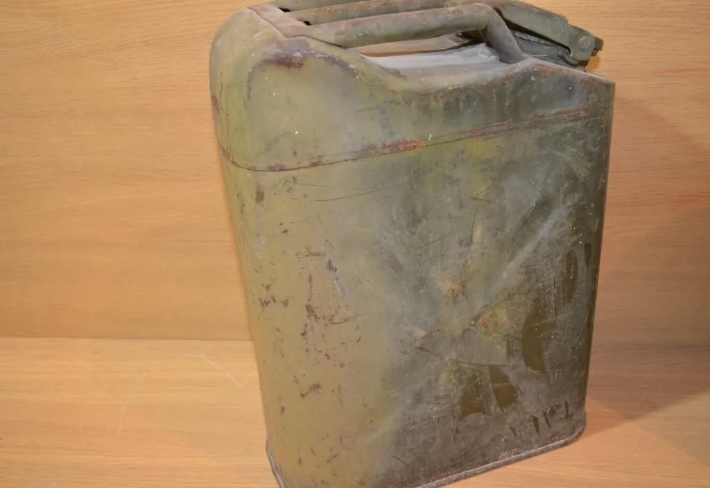 Vintage military-style steel fuel jerrycan