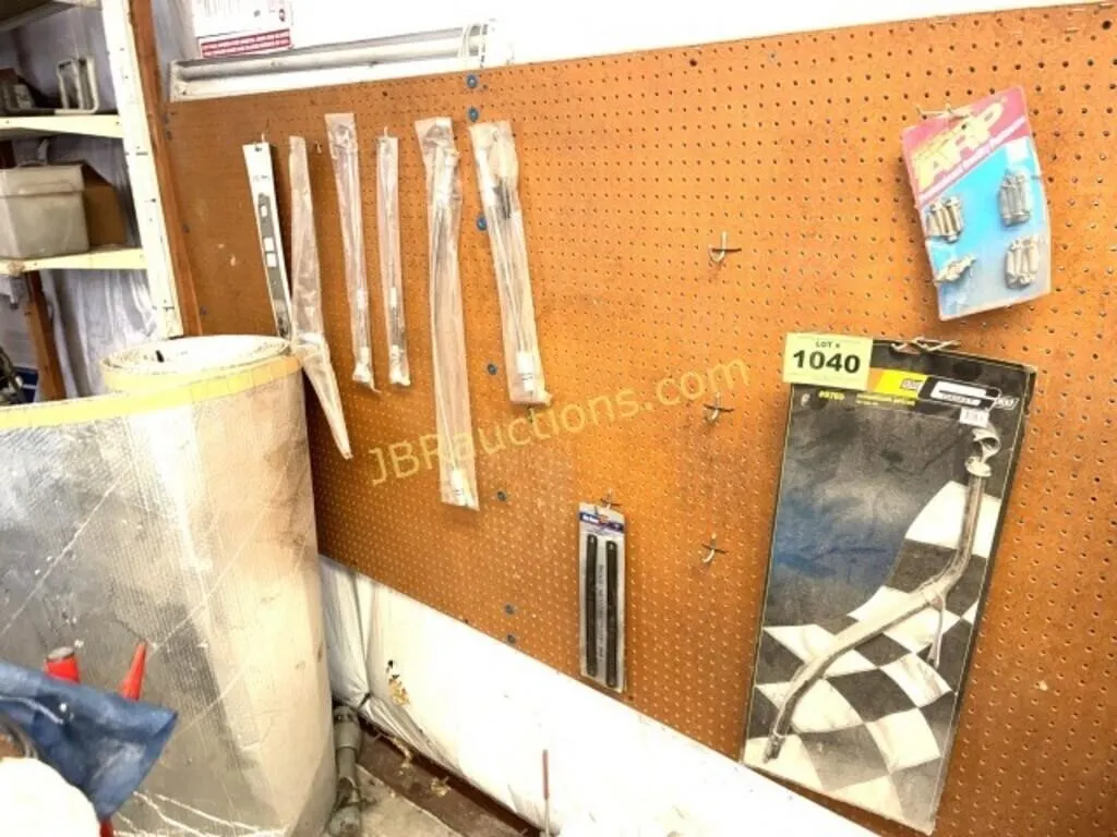 CARPARTS ON PEG BOARD, OIL DIP STICKS ETC.