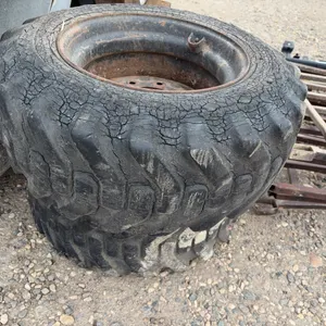 2 - 10-16.5 Skid Steer Rims - Tires No Good