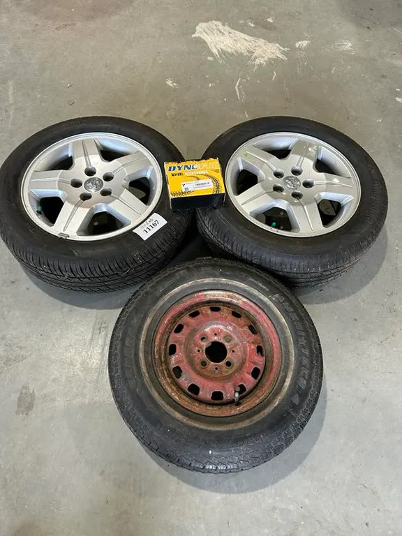 (2) 215/60R17 Tires, (1) 185/80R13 Spare Tire & Dyno Fit Wheel Accessories