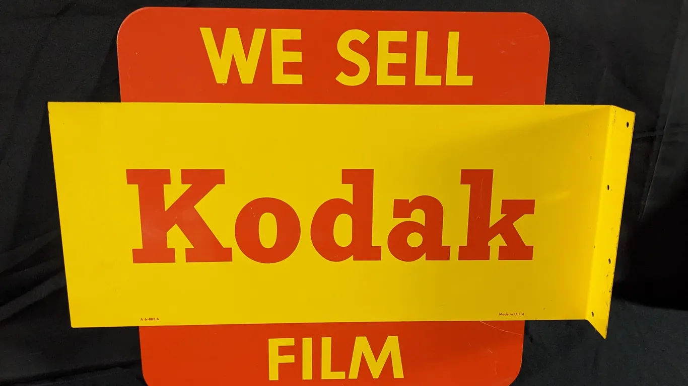 TIN FLANGE SIGN WE SELL KODAK FILM