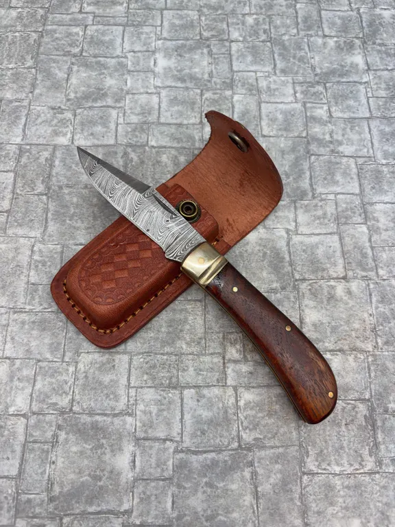 Damascus Steel Knife with Resin Handle and Leather Sheath