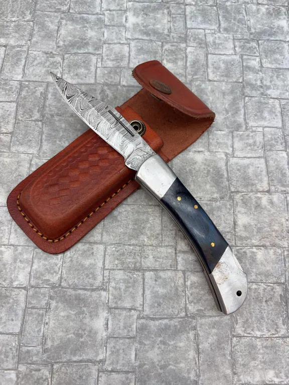 Damascus Steel Knife with Resin Handle and Leather Sheath
