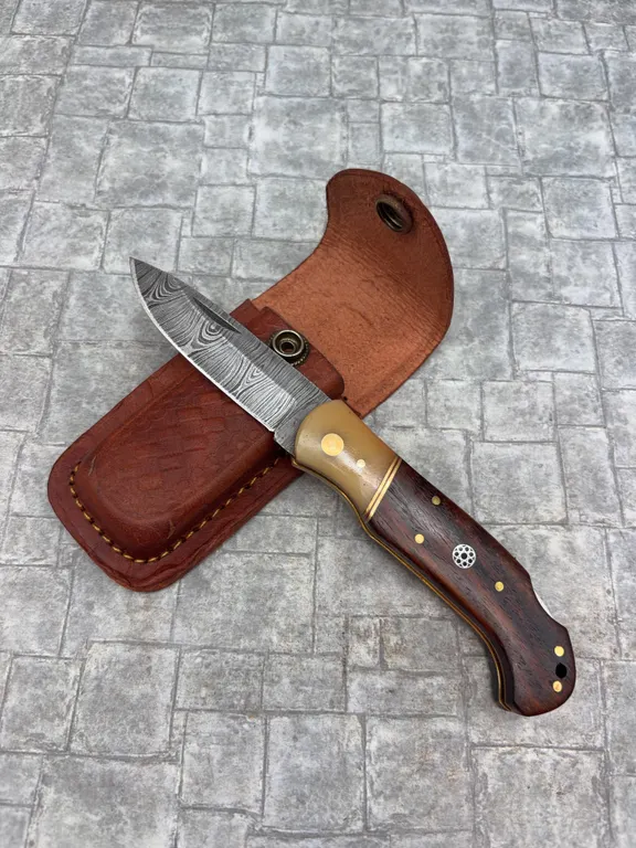 Damascus Steel Knife with Resin Handle and Leather Sheath