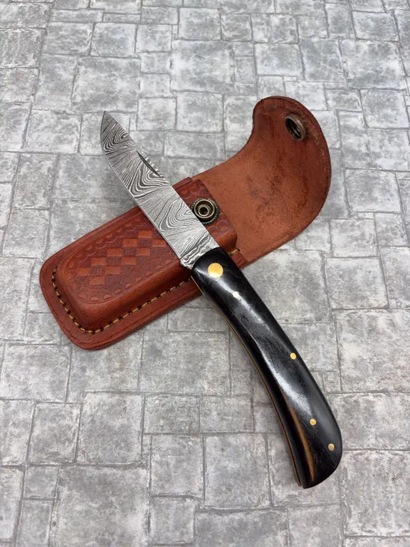 Damascus Steel Knife with Resin Handle and Leather Sheath