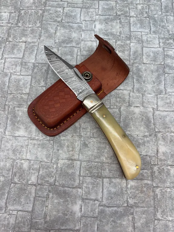 Damascus Steel Knife with Resin Handle and Leather Sheath