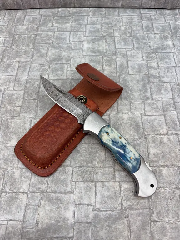 Damascus Steel Knife with Resin Handle and Leather Sheath