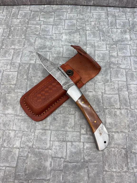 Damascus Steel Knife with Resin Handle and Leather Sheath