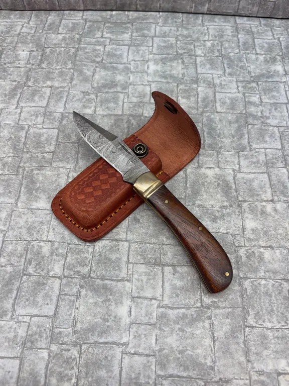 Damascus Steel Knife with Resin Handle and Leather Sheath
