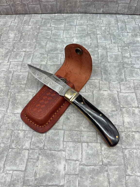 Damascus Steel Knife with Resin Handle and Leather Sheath