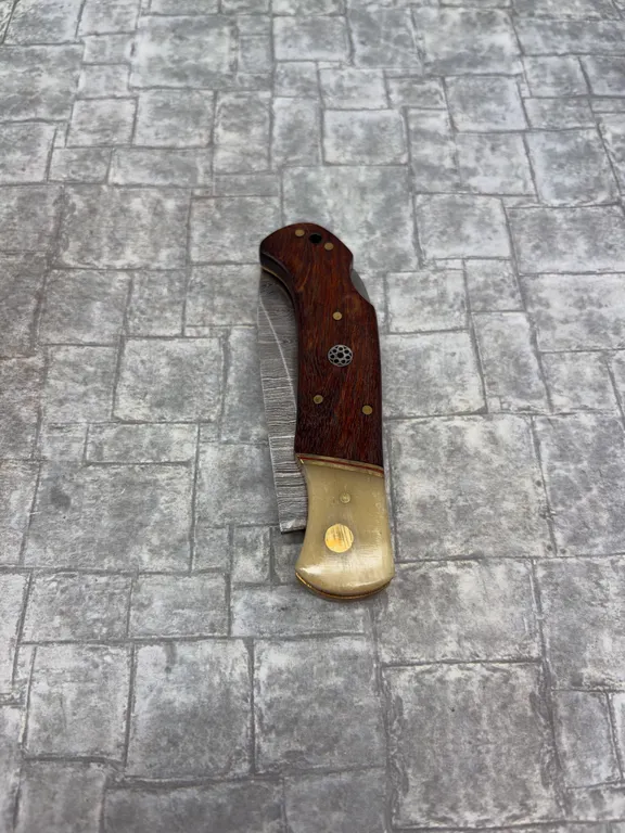 Damascus Steel Knife with Resin Handle and Leather Sheath