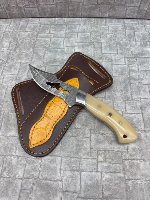 Damascus Steel Knife with Resin Handle and Leather Sheath