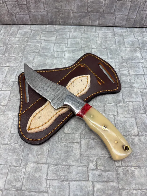 Damascus Steel Knife with Resin Handle and Leather Sheath