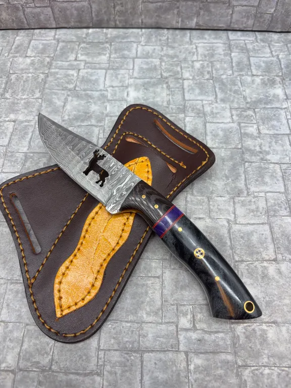 Damascus Steel Knife with Resin Handle and Leather Sheath