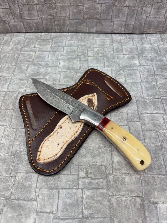 Damascus Steel Knife with Resin Handle and Leather Sheath