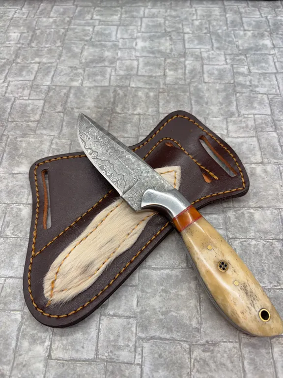 Damascus Steel Knife with Resin Handle and Leather Sheath