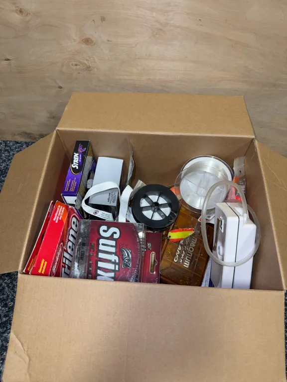 Miscellaneous box of fishing line and tackle