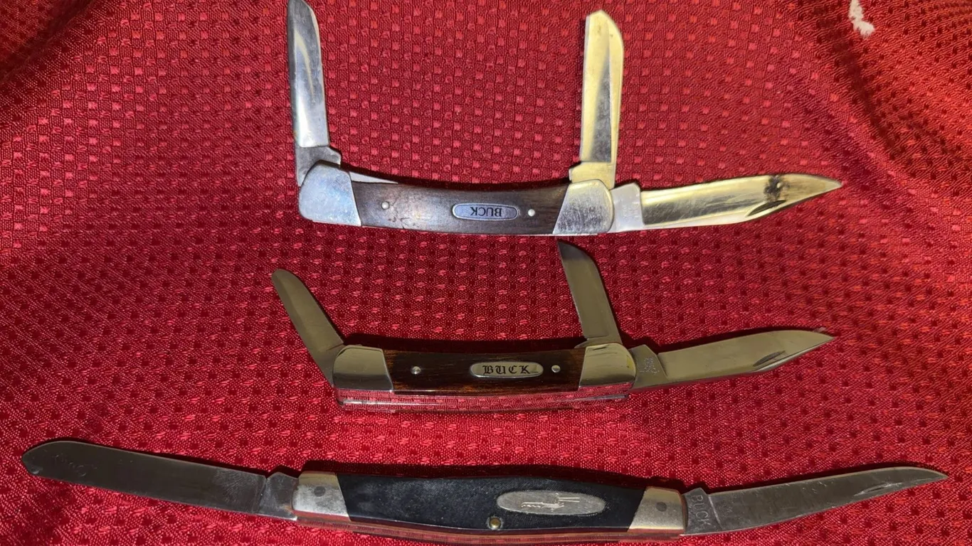 Set of three buck knives