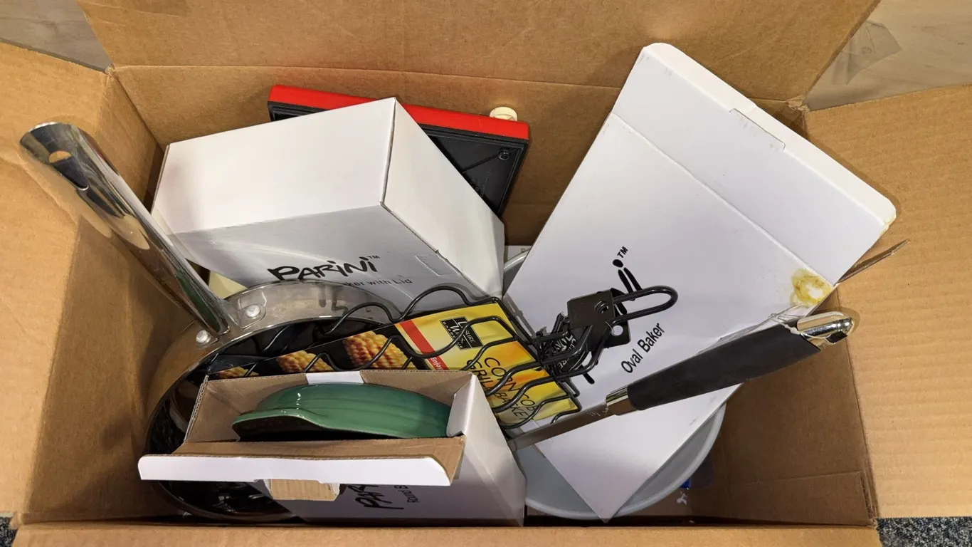 Box of pots and pans and miscellaneous cookware