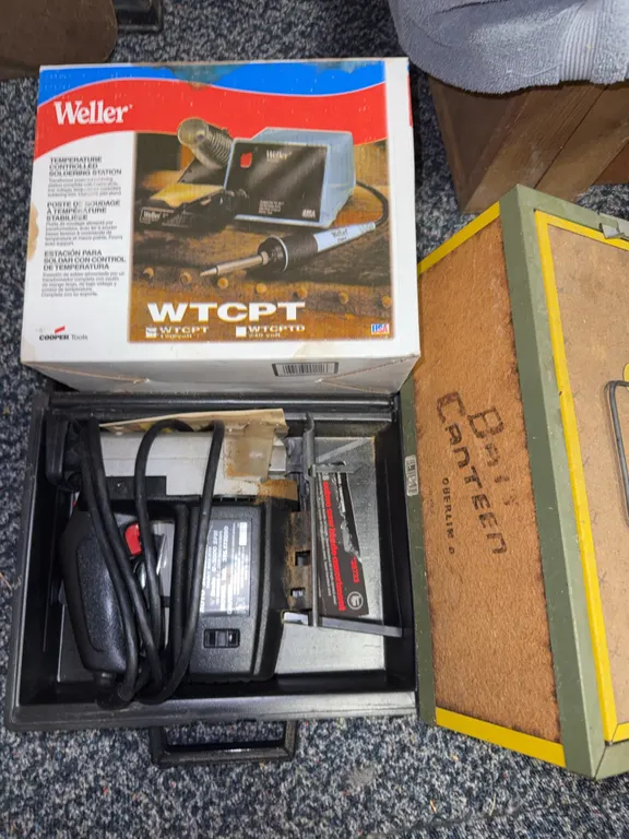Electric soldering iron jigsaw in box