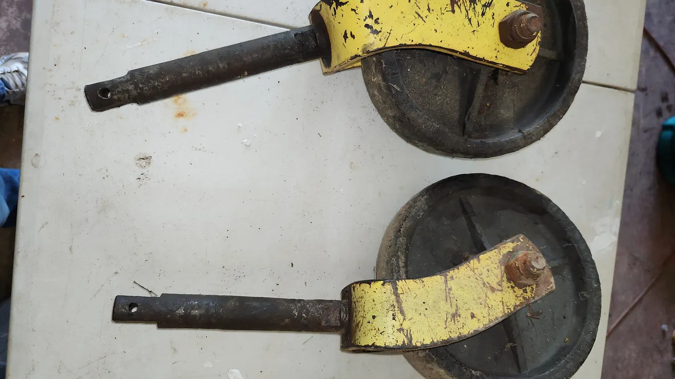 2 John Deere Mower Deck Wheels