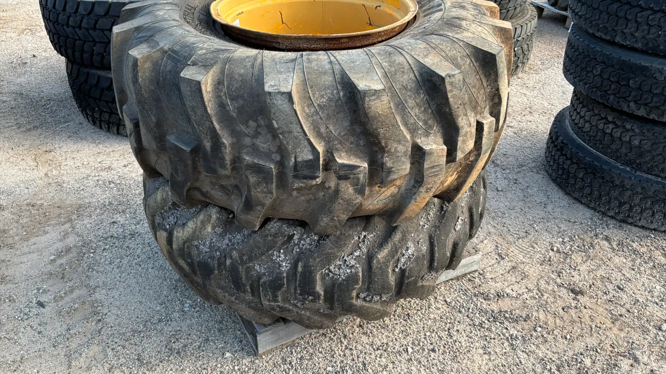 QTY OF (2) JOHN DEERE 18.4-24 WHEELS/TIRES