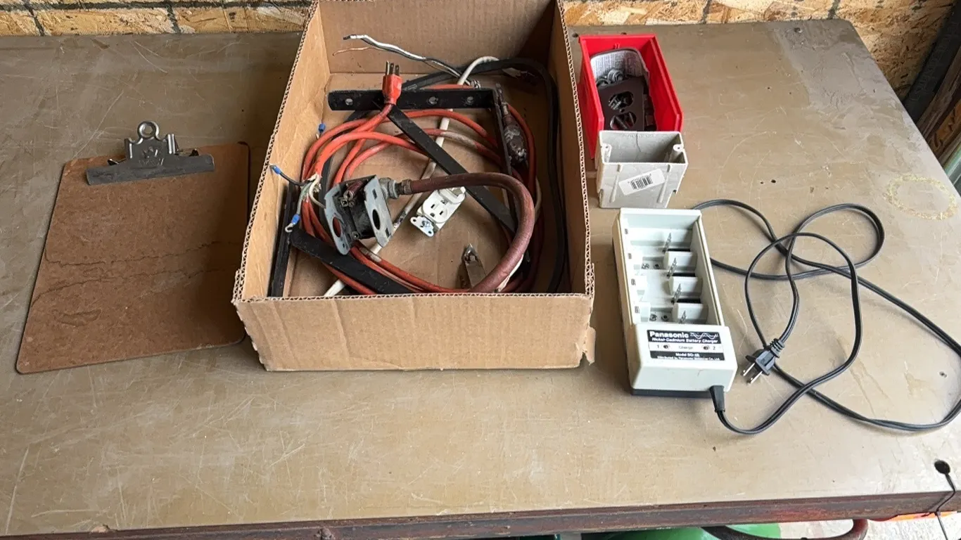 Battery charger, outlet, and chords