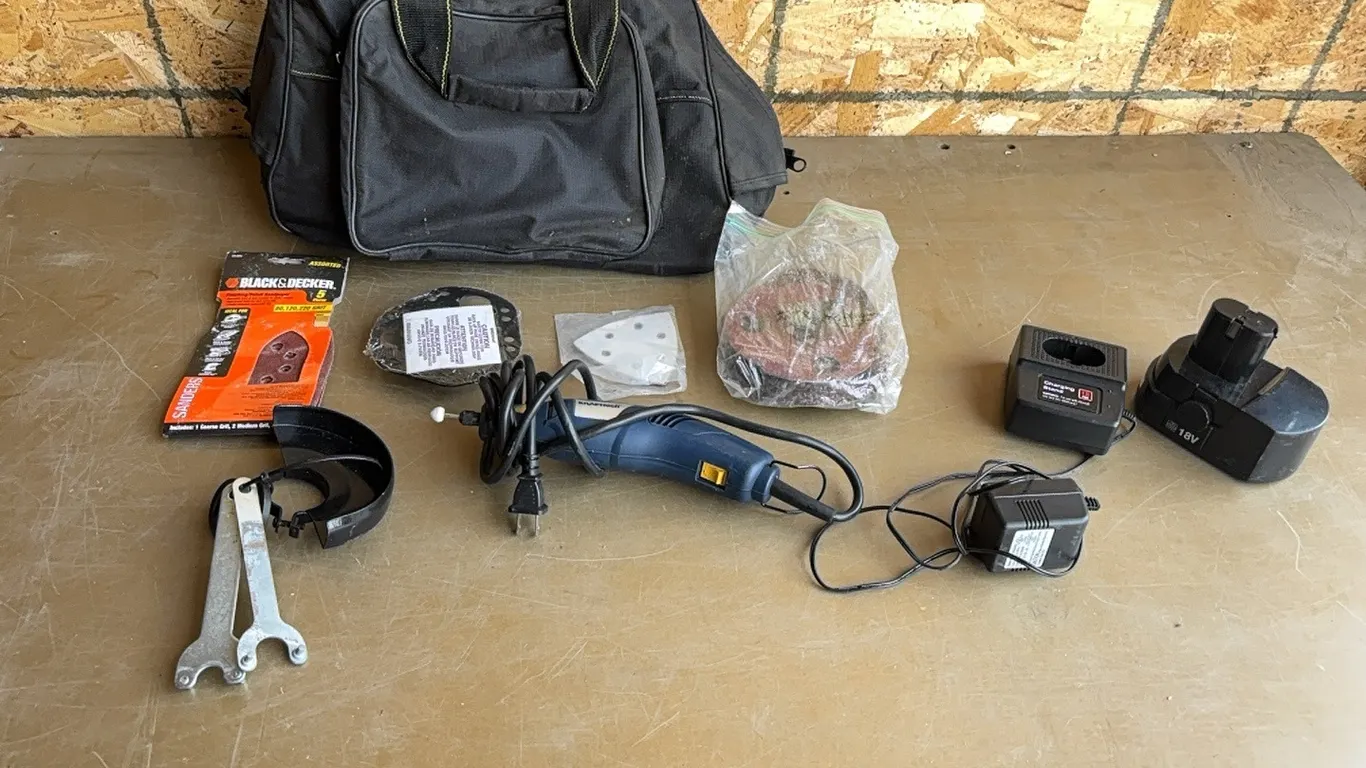 Tool bag, rotary tool, sanding pads, battery with charger, and grinder guard