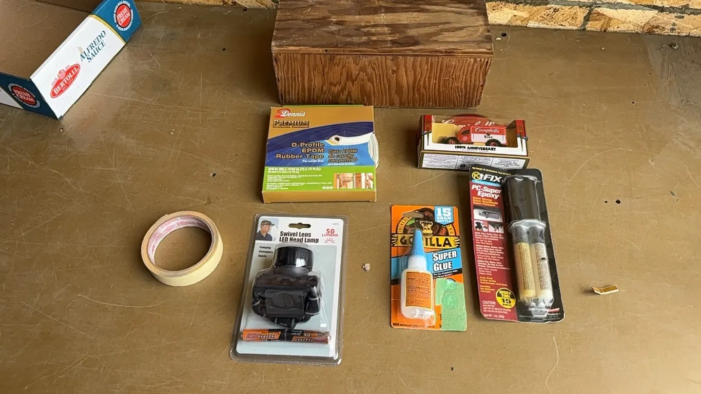 Wood box, tape, super glue, and misc