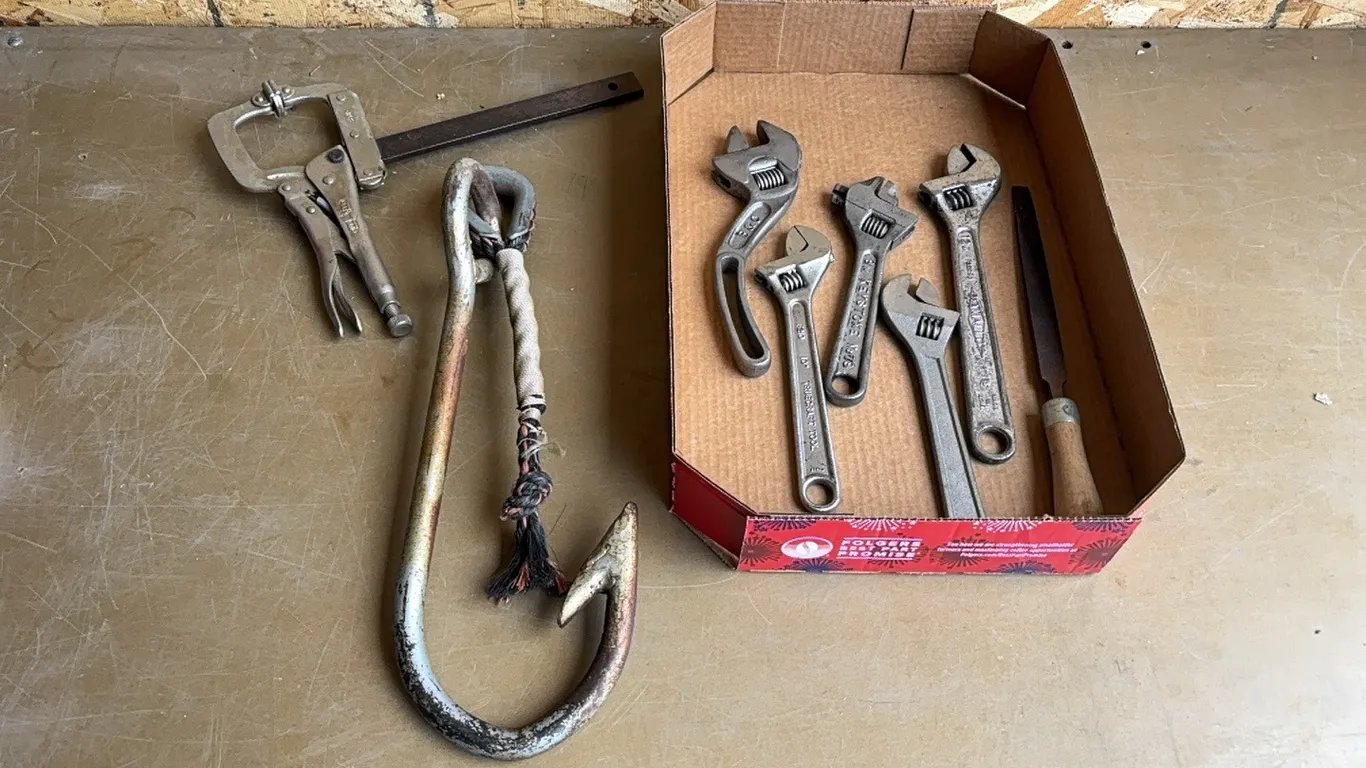 Welding clamp, crescent wrenches, large hook, and file