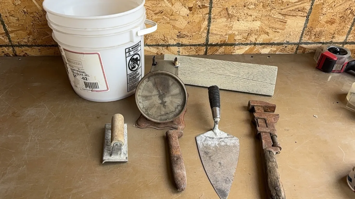 Monkey wrench, scale, and trowel
