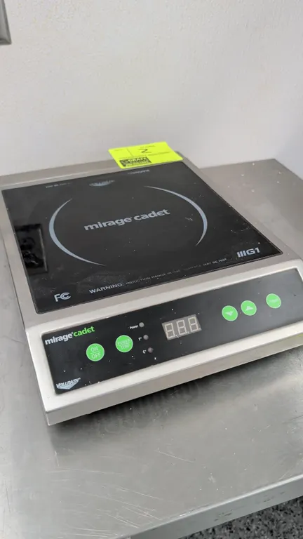 Vollrath Mirage Cadet 59300 countertop induction range. Features digital controls, LED display, and timer function. S/N: G175-00315112-336. Electrical