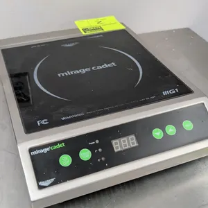 Vollrath Mirage Cadet 59300 countertop induction range. Features digital controls, LED display, and timer function. S/N: G175-00315112-336. Electrical