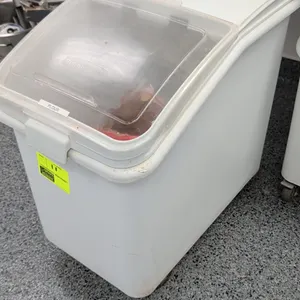Rubbermaid polyethylene ingredient bin. Features a clear flip-top lid with latch. 18"W. Mounted on casters. Contents not included.