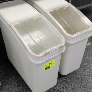 Baker's Mark poly ingredient bins. Features clear sliding lids and white plastic construction. 12"W each. Mounted on casters.