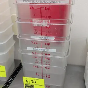 8-quart clear plastic food storage containers. Features red graduated measurement markings in quarts and liters. Includes (2) red lids.