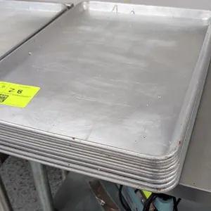 Full-size aluminum sheet pans. Features wire-reinforced rolled rims and aluminum construction. Table and background equipment not included.
