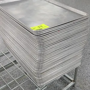 Full-size aluminum sheet pans. Features commercial aluminum construction with wire-reinforced rolled rims. Cart not included.