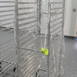 20-pan front load channel sheet pan rack with clear zippered cover. Accommodates 18" x 26" sheet pans. Features 20 slide tiers. Mounted on casters.