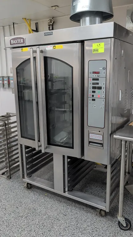 Baxter OV310G gas rotating rack oven. Features stainless steel construction, dual glass doors, digital control panel, and an additional rack insert. M