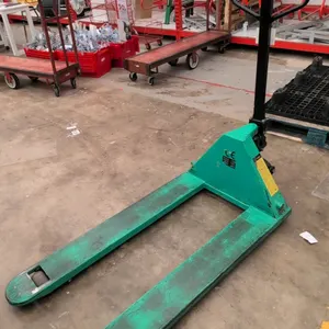 Wesco manual pallet jack. Features a 5,500 lb capacity, 27"W x 48"L forks, looped handle with 3-position hand control release lever, and dual front st