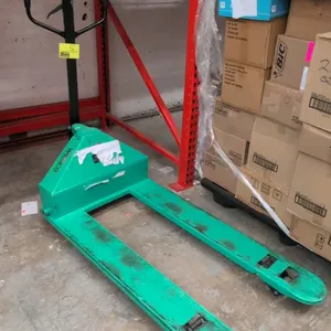 Wesco manual pallet jack. Features steel construction with green finish, 4,400 lb capacity, and loop handle with fingertip release lever. Fork dimensi