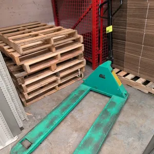 Wesco manual pallet jack. Features a 5,500 lb load capacity and 27"W x 48"L forks. Note: Handle is damaged at the base.