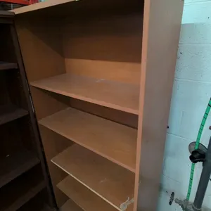 Laminate wood 5-tier bookshelf. Features adjustable shelving and a woodgrain finish. 36"W x 14"D x 73"H.